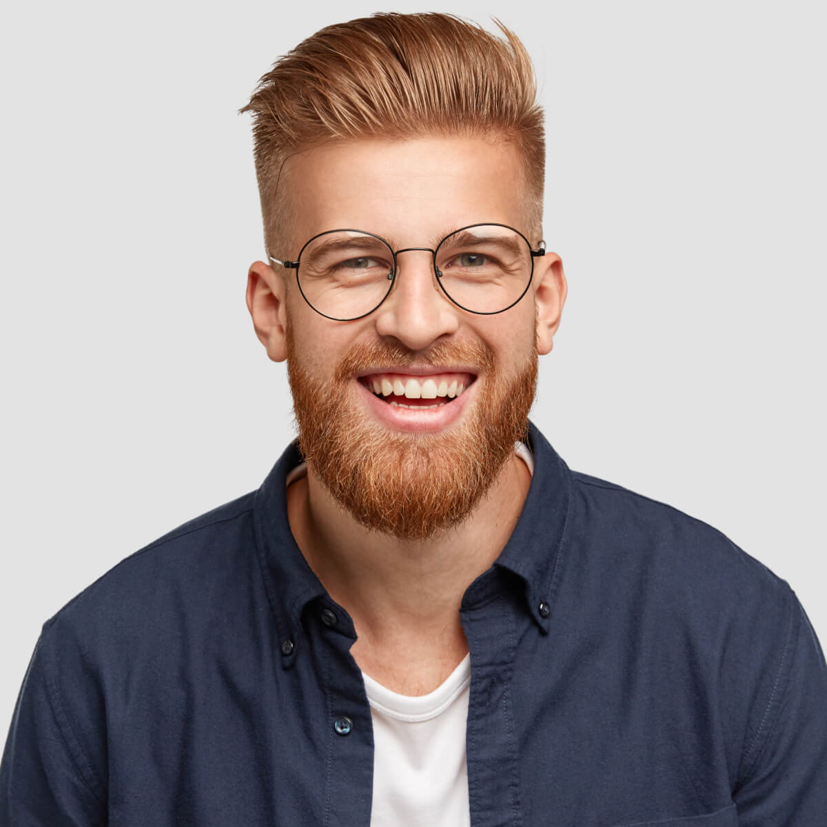 pleased cheerful redhaired male with pleasant smil ccxayzl.jpg